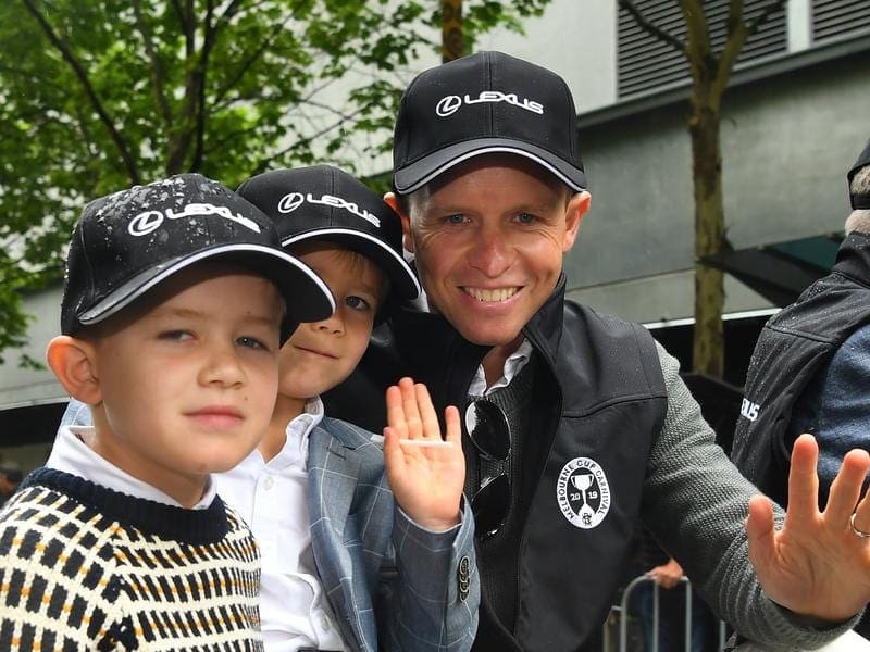 Kerrin McEvoy with his family at the Melbourne Cup parade.
