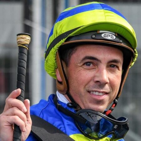 How many Melbourne Cups has Dean Holland won?