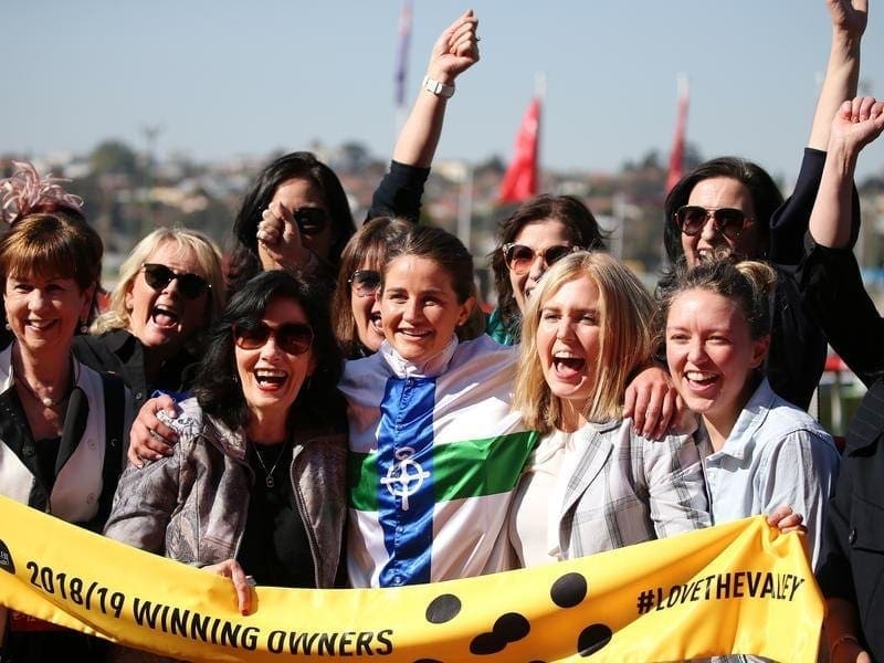 Trainer-jockey Michelle Payne and her winning owners.